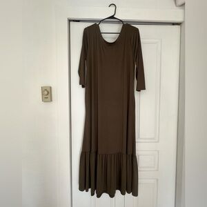 Khaki green Maxi Dress with Ruffle Hem with three-quarter length sleeves.